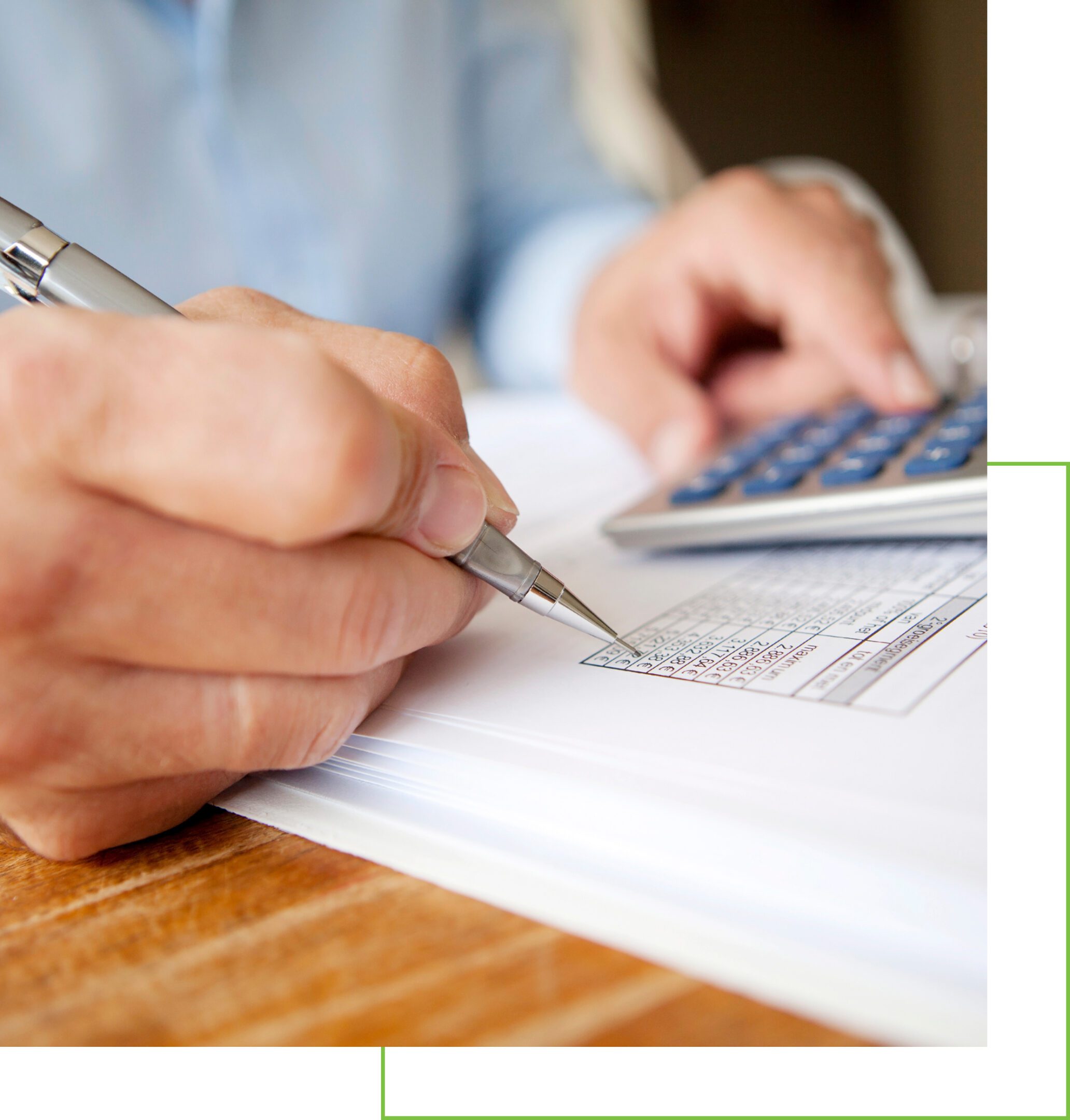 Person calculating finances with pen and calculator.