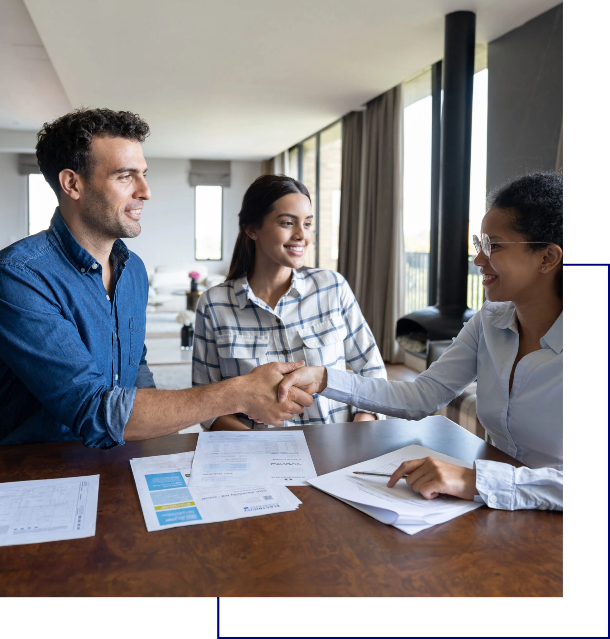 Young couple consulting with a professional at an office.