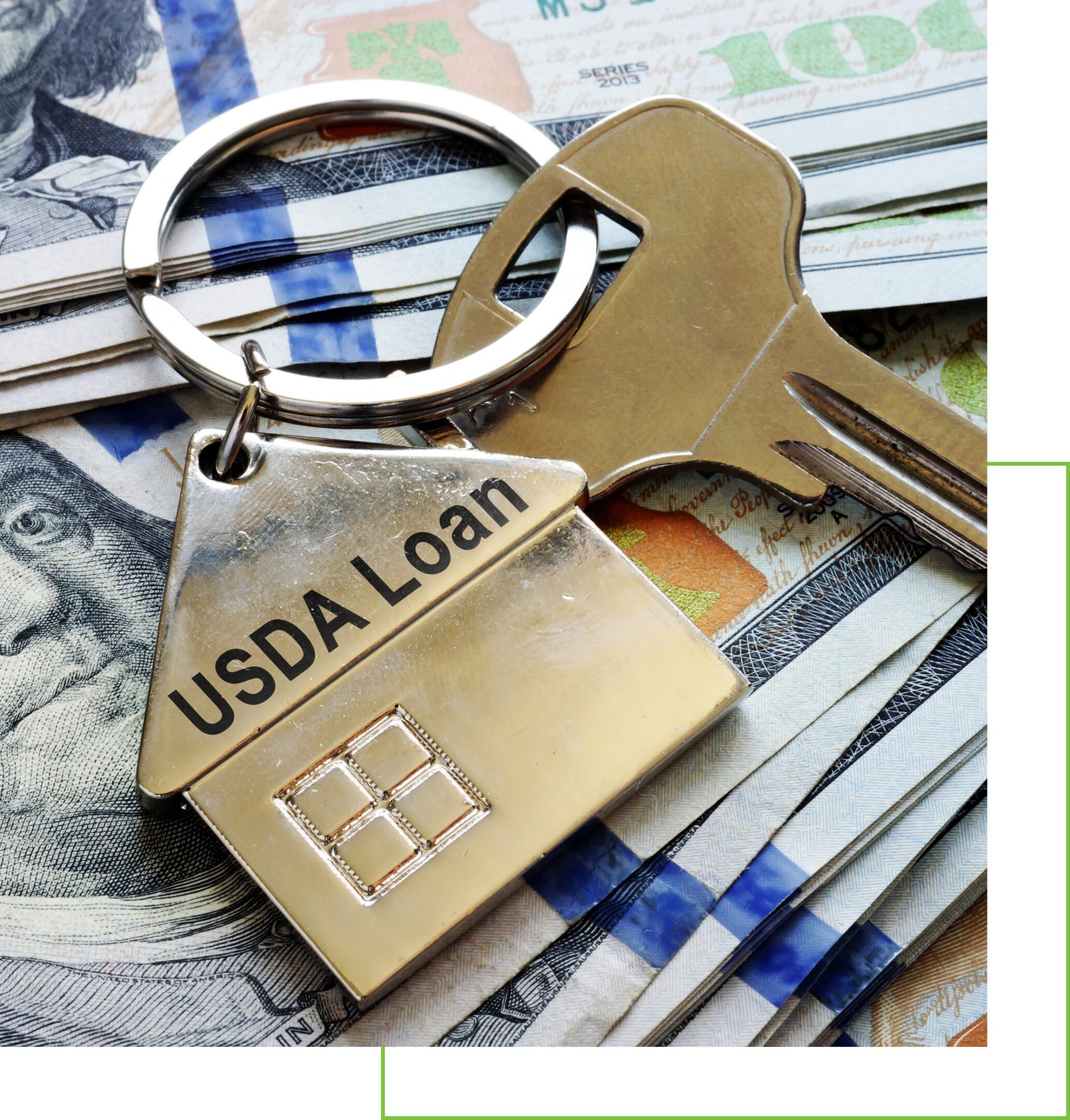House key with a USDA Loan tag on money.